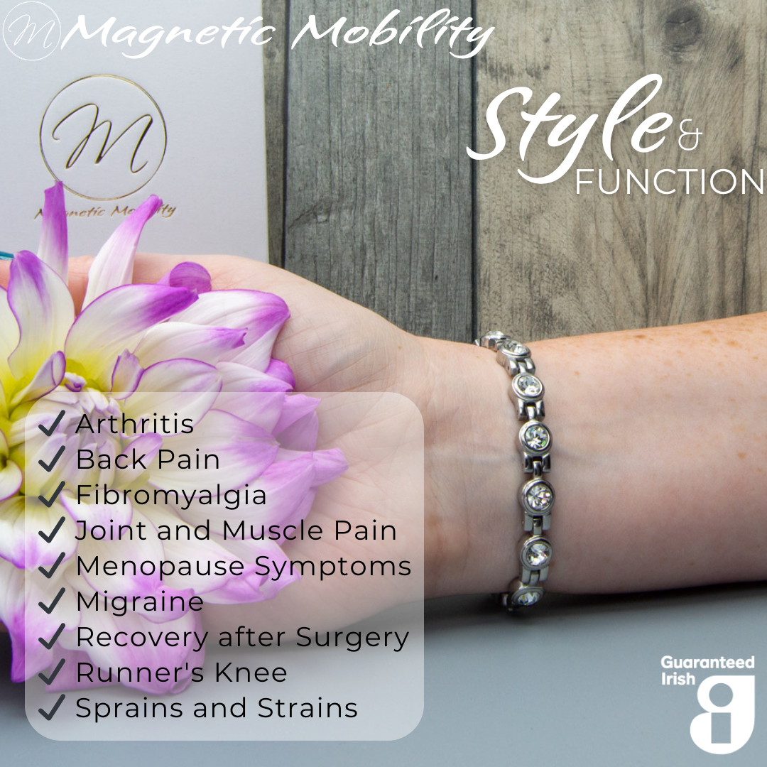 Angelica's Star 4in1 Magnetic Bracelet from Magnetic Mobility worn on a wrist, highlighting Swarovski crystals and sivler design. Includes 4in1 elements: neodymium magnets, FIR elements, germanium, and negative ions for stylish pain relief.