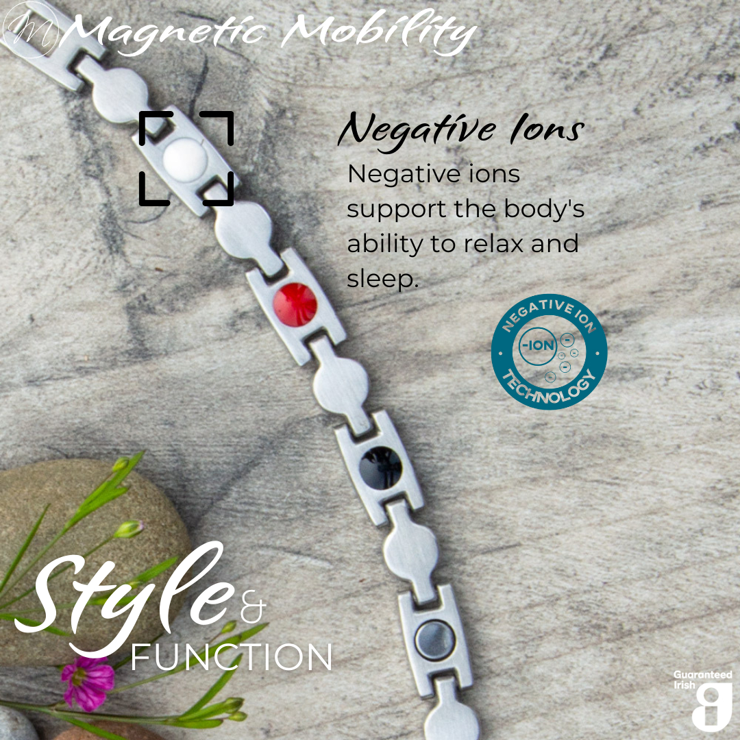 Close-up of Avens Star 4in1 magnetic bracelet by Magnetic Mobility, highlighting negative ion technology. Supports the body's ability to relax and sleep. Perfect for arthritis, back pain, fibromyalgia, joint and muscle pain, menopause symptoms, migraine, recovery after surgery, runner's knee, sprains and strains.