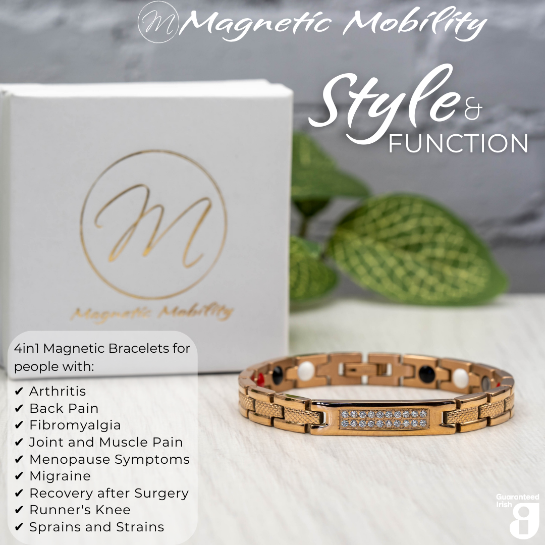 Front view of the Honesty Dawn 4in1 magnetic bracelet by Magnetic Mobility, promoting arthritis, back pain, fibromyalgia relief with a stylish rose gold design featuring a central panel with sparkling crystals. The bracelet is shown in front of its luxury white gift box.