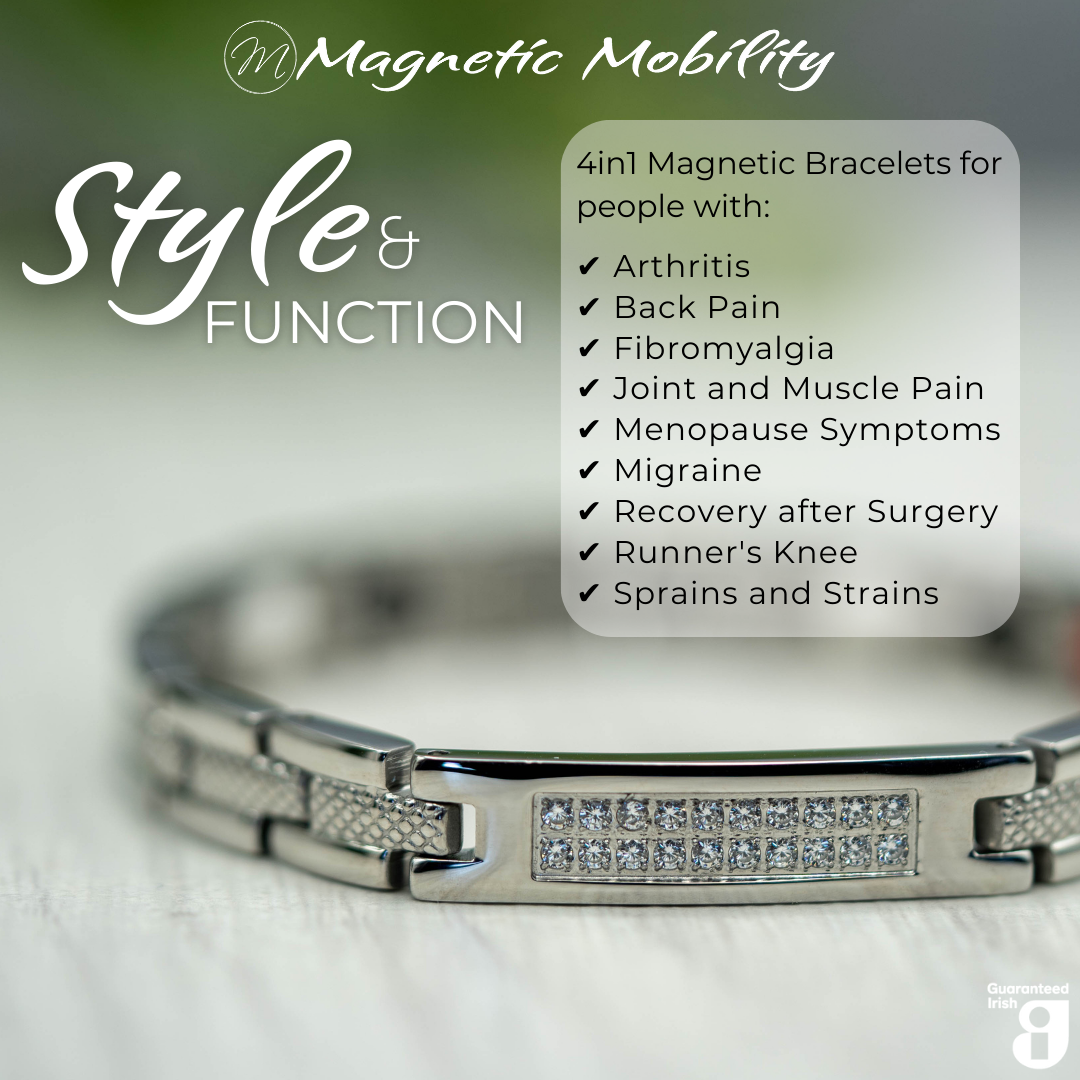 45 degree view of the Honesty Star 4in1 Magnetic Bracelet from Magnetic Mobility in silver finish. Features a central panel with sparkling crystals and includes Neodymium Magnets, FIR elements, Germanium, and Negative Ions for therapeutic benefits. Stylish design with embedded therapeutic elements. White gift box shown behind the bracelet. 