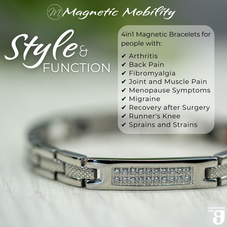 45 degree view of the Honesty Star 4in1 Magnetic Bracelet from Magnetic Mobility in silver finish. Features a central panel with sparkling crystals and includes Neodymium Magnets, FIR elements, Germanium, and Negative Ions for therapeutic benefits. Stylish design with embedded therapeutic elements. White gift box shown behind the bracelet. 