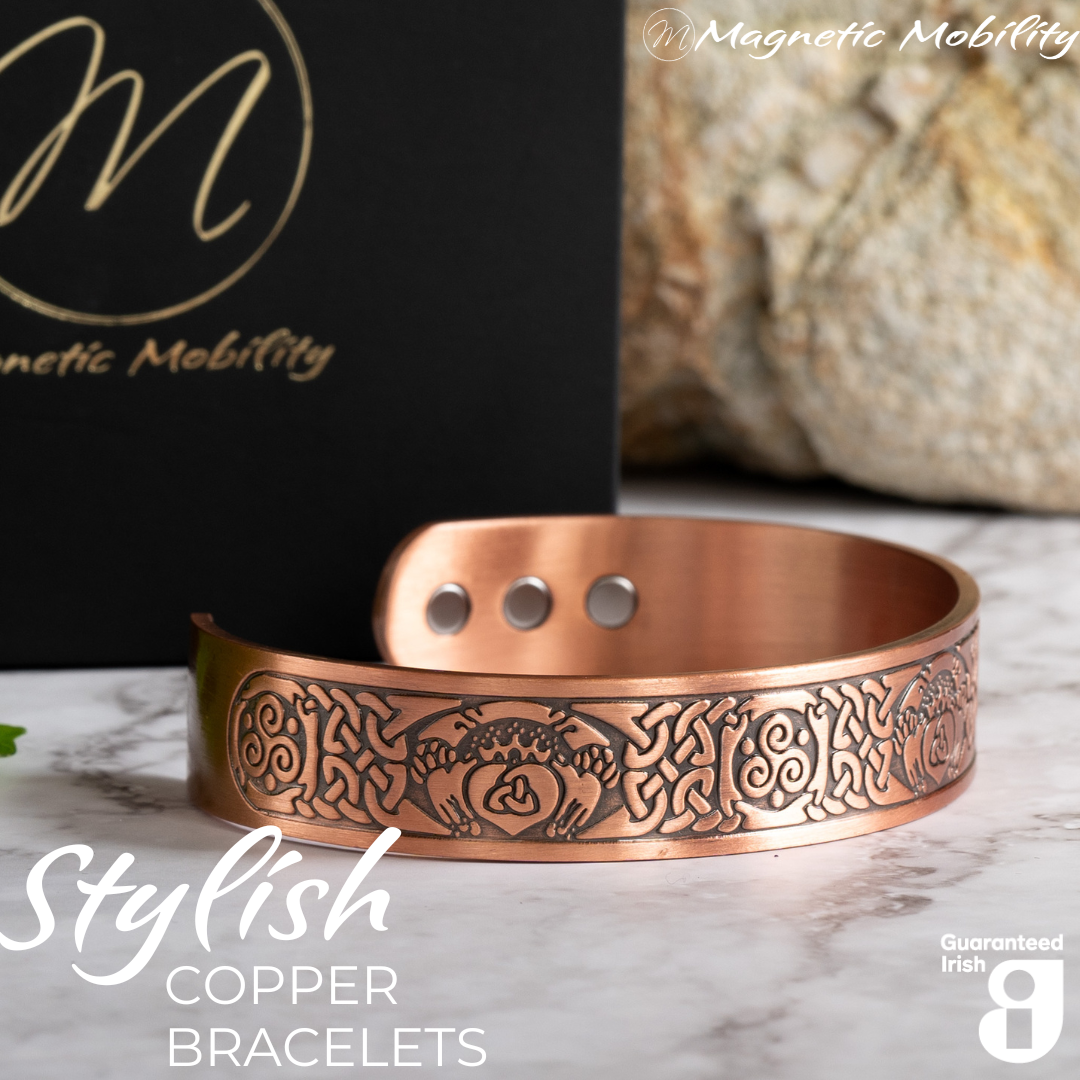 Close up view of the Claddagh design on this Claddagh Copper Magnetic Bracelet from Magnetic Mobility. 3 Magnets are also visible on the back of the bracelet. 