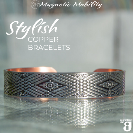 Silver Hawthorn Copper Magnetic Bracelet from Magnetic Mobility featuring 99.9% pure copper with an intricate design. The bracelet includes neodymium magnets for effective pain relief. Text on image: '99.9% pure copper' and 'Neodymium magnet'