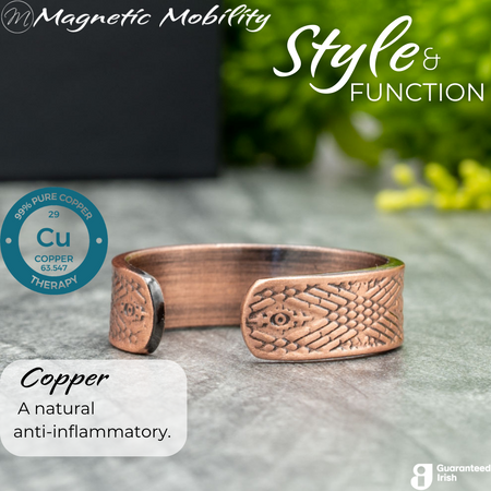 Back view of the Hawthorn copper ring from Magnetic Mobility. Shown on a white gift box with green plants in the background. The writing says "Style and Function" and shows a Guaranteed irish logo. 