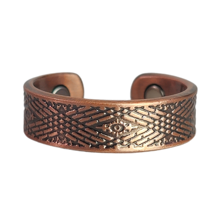 Hawthorn copper ring by Magnetic Mobility featuring an intricate geometirc design. This adjustable ring is designed to be easily worn on arthritic fingers, providing both style and functionality.