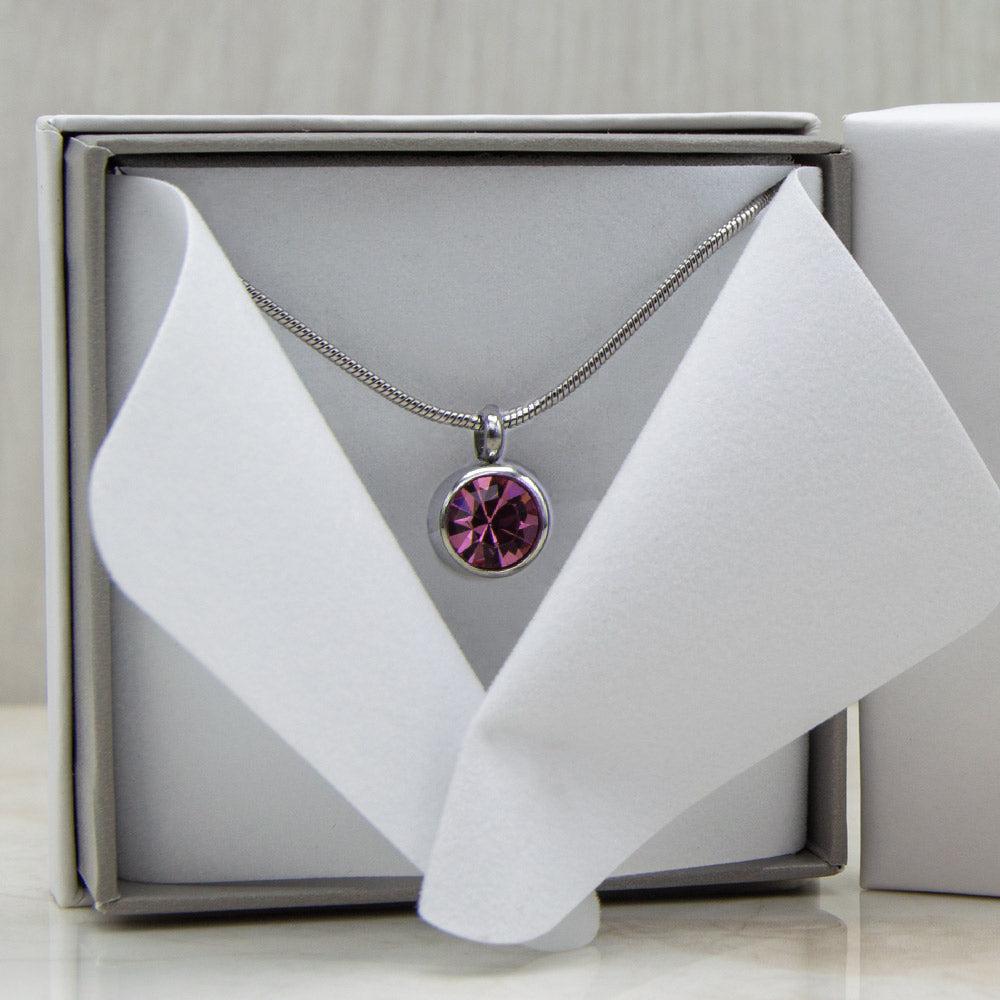 Pink Toumaline Magnetic Necklace in a white gift box. 