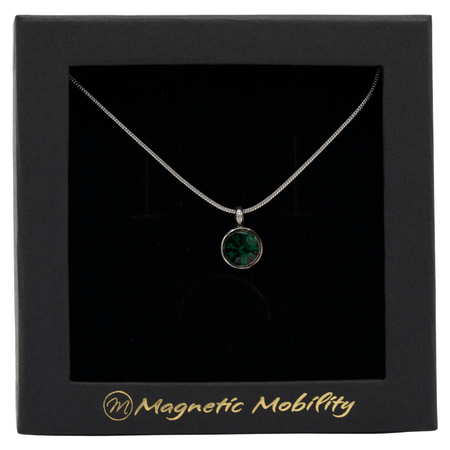 May Magnetic Mobility Birthstone Necklace with a green Swarovski crystal pendant. Designed to help with neck pain, beautifully presented in black packaging with Magnetic Mobility logo