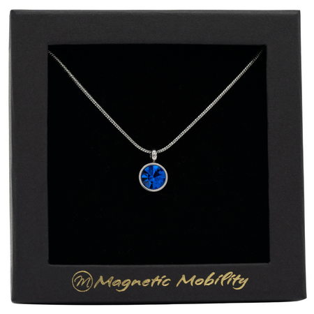 September Magnetic Mobility Birthstone Necklace with a blue Swarovski crystal pendant. Designed to help with neck pain relief, elegantly presented in black branded packaging.